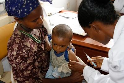 Boy receiving malaria vaccine