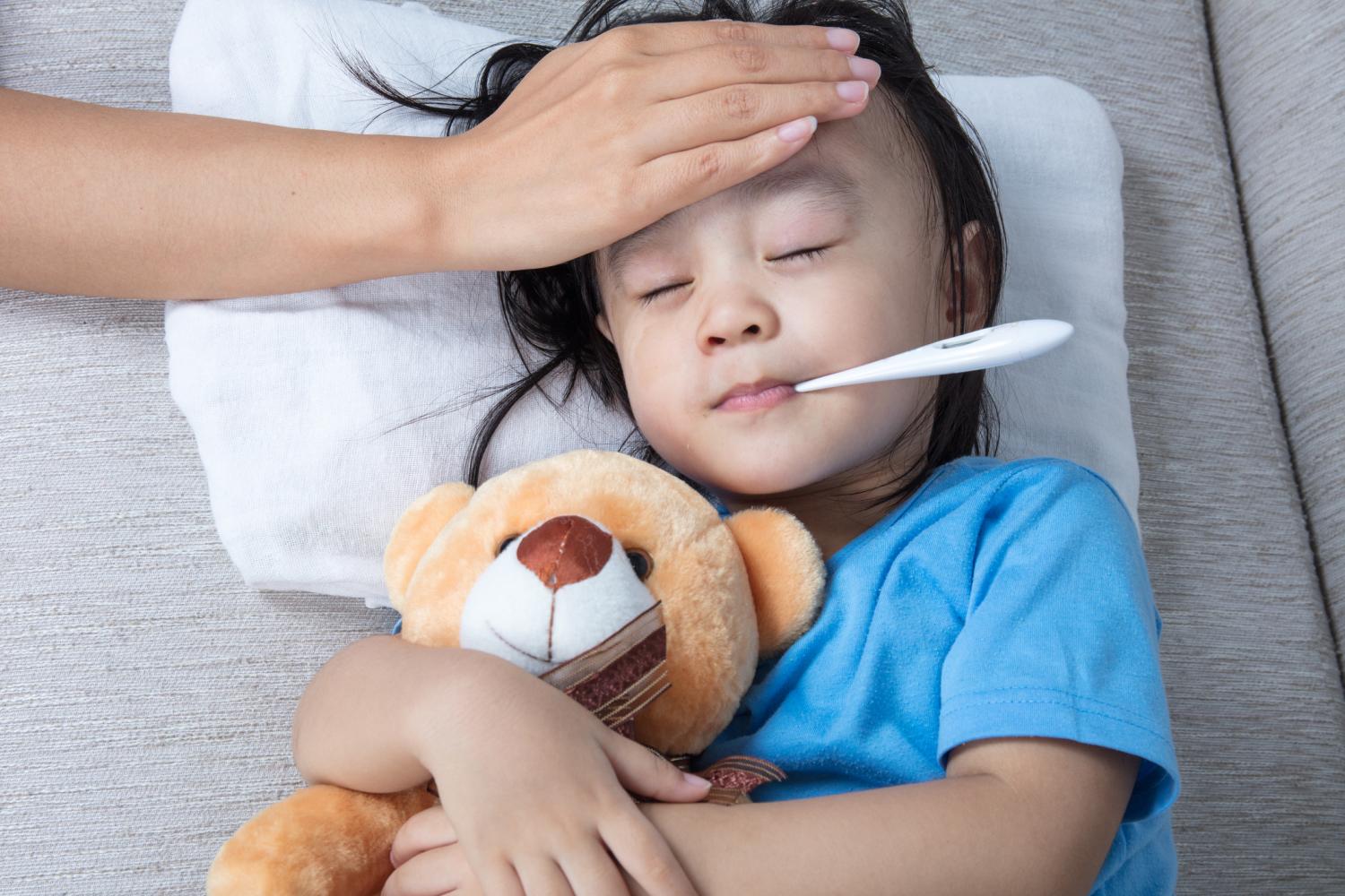 Young Asian girl with fever
