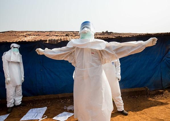 Ebola burial team with protective equipment