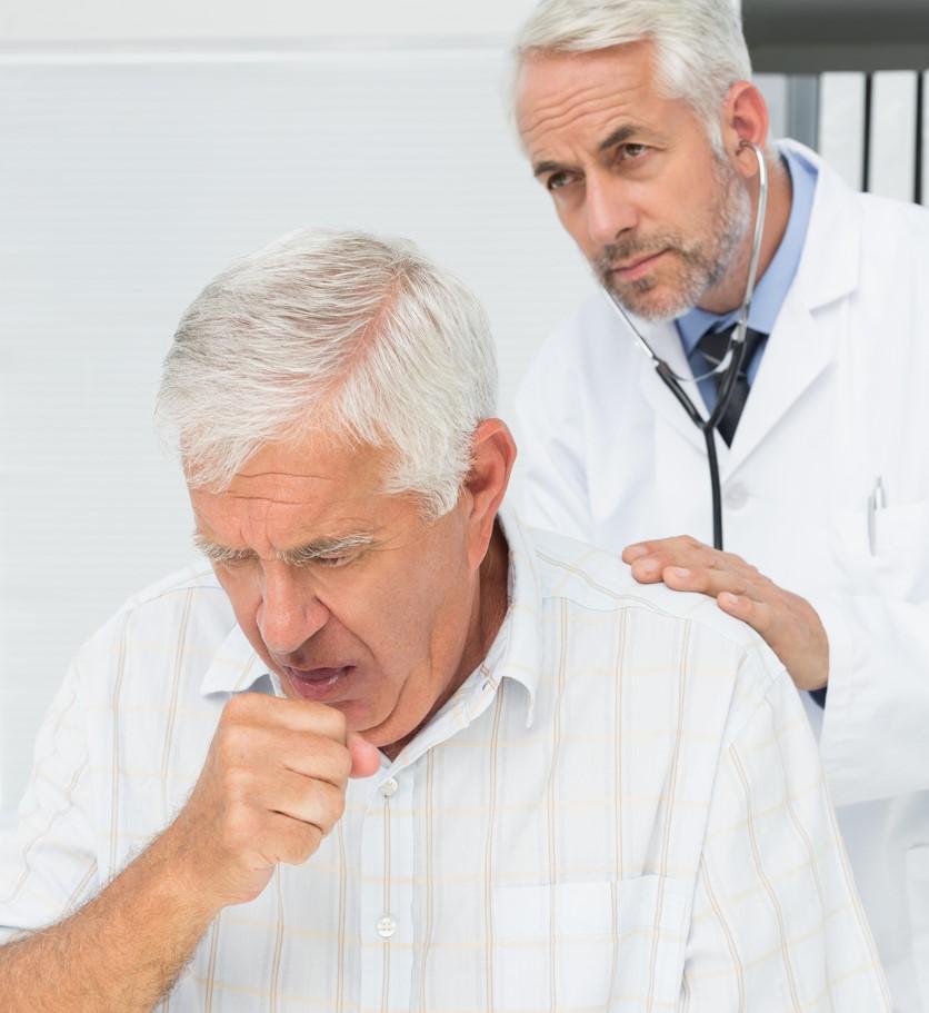 Examining coughing senior