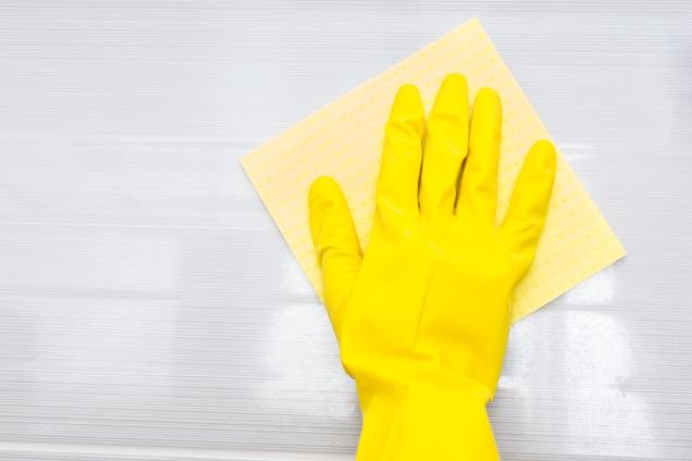 Gloved cleaning hand