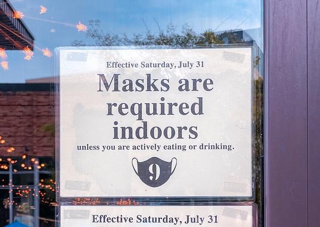 Masking indoors sign