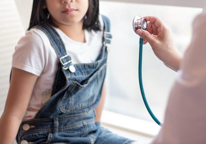 Girl and doc with stethoscope