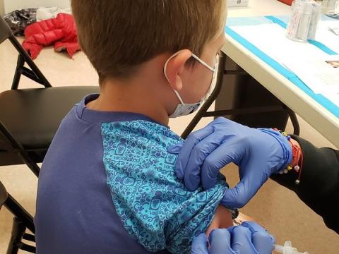 boy getting vaccinated 