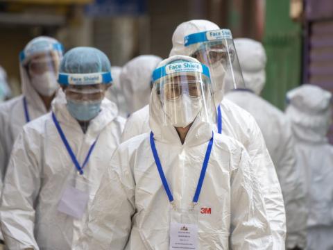 Hong Kong healthcare workers in full PPE