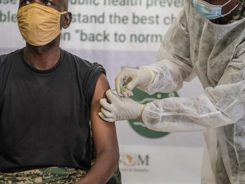 Ugandan soldier getting COVID vaccine