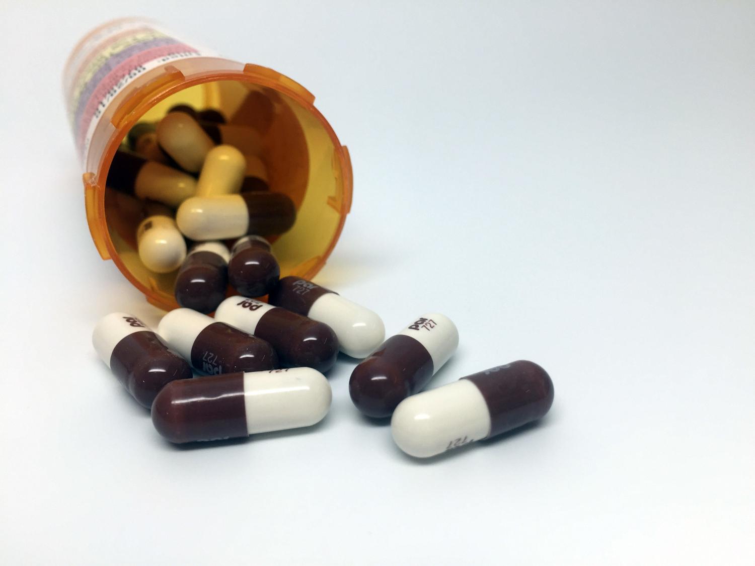 Doxycycline bottle and pills