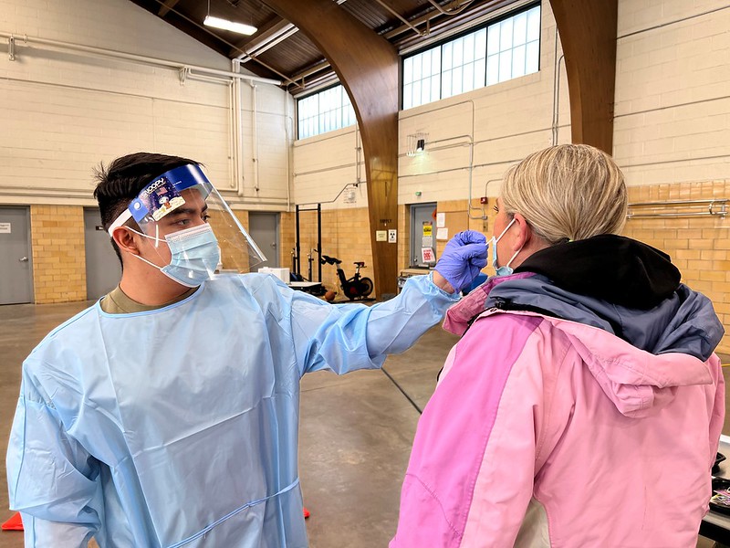Health workers conducting COVID testing