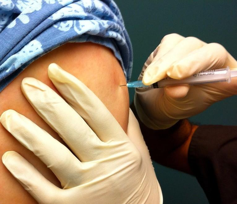 Woman getting vaccinated