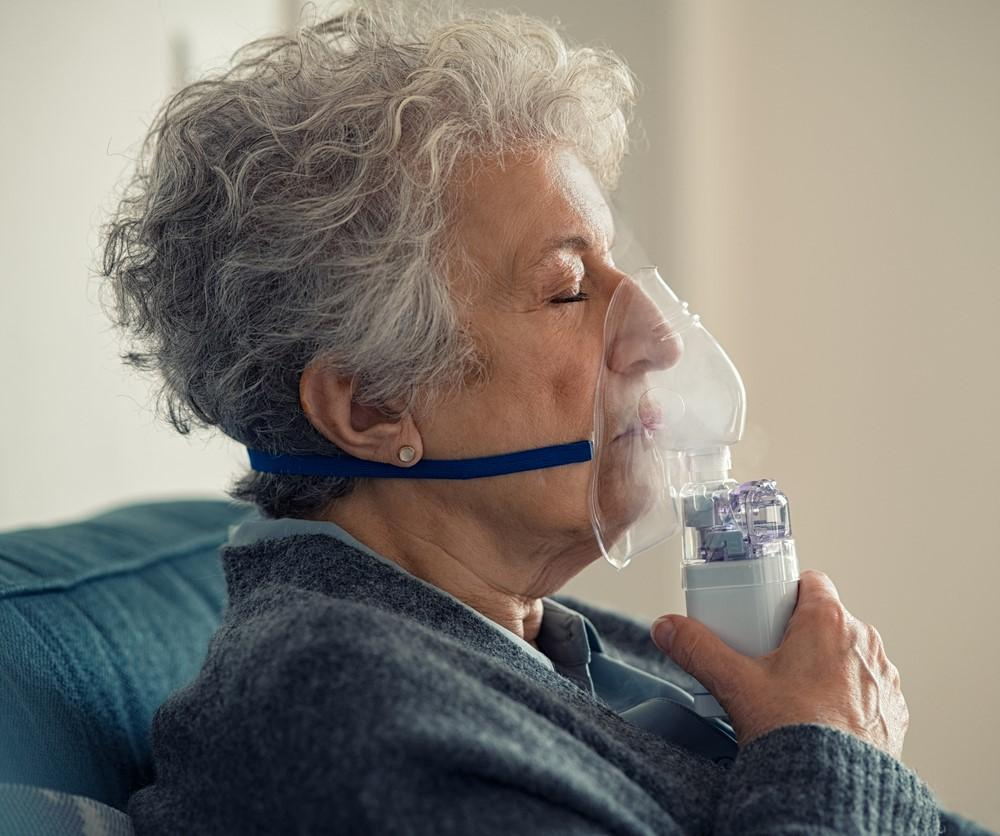 Woman with nebulizer