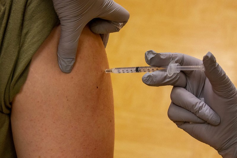 Needle going into arm