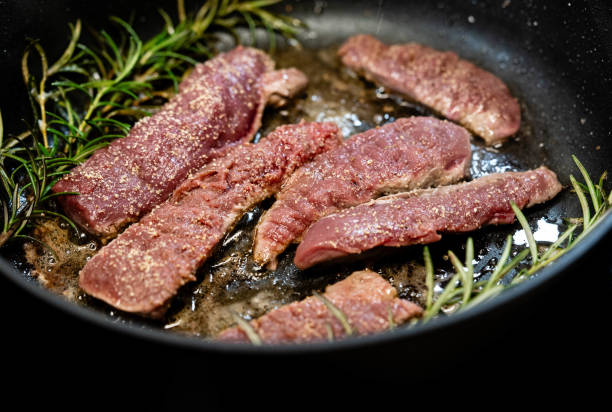 Venison in frying pan