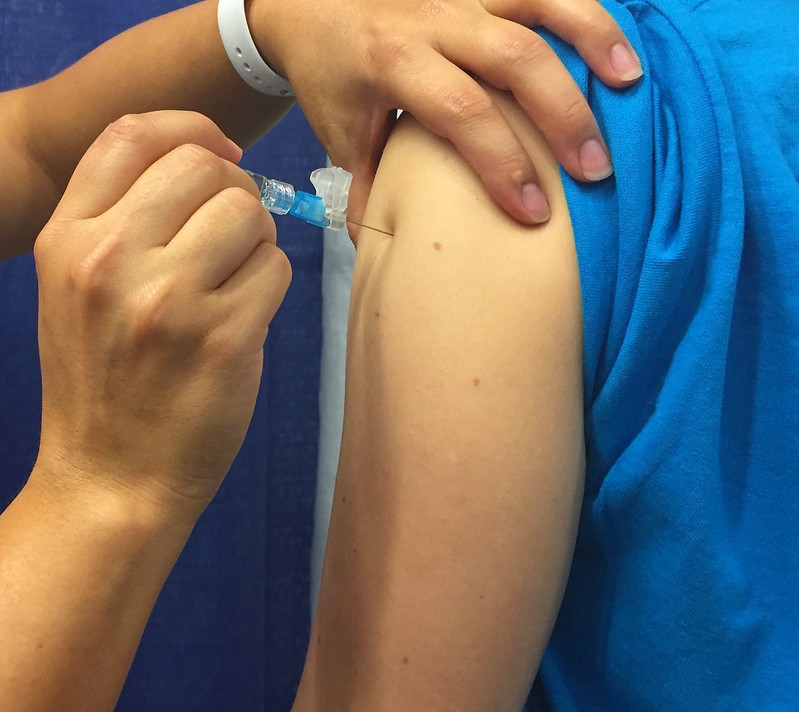 Flu shot in arm