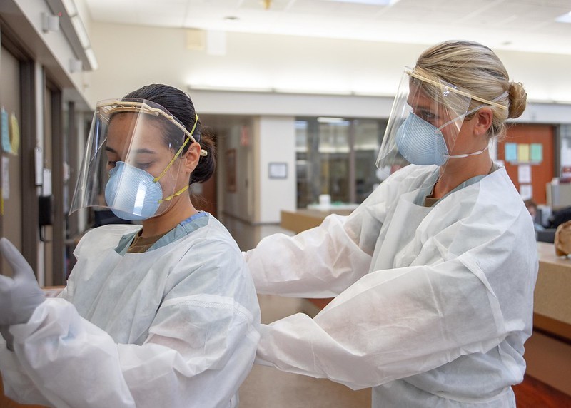 Healthcare workers wearing protective equipment