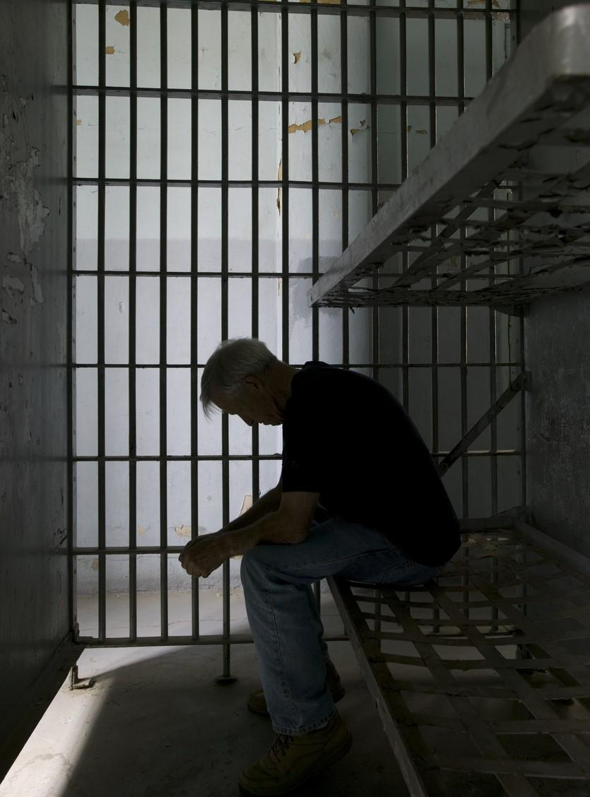 Inmate in locked cell