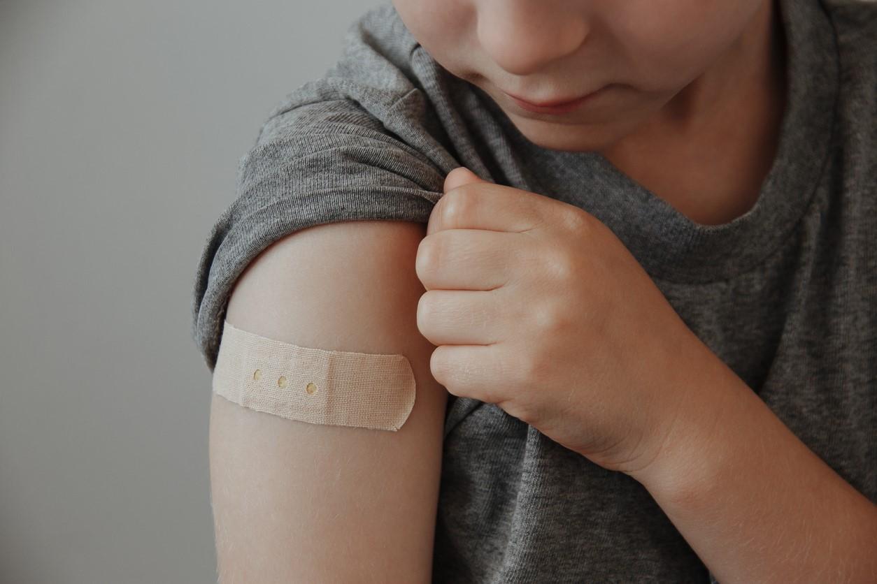 Young boy after vaccination