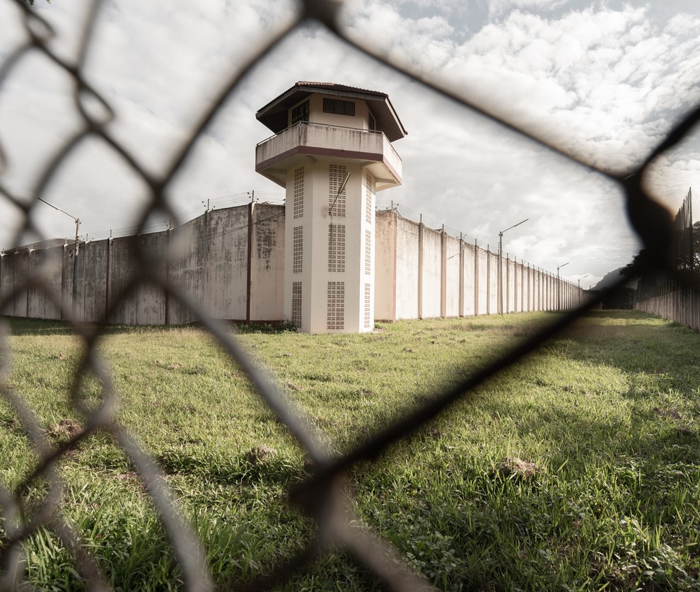Prison through fence