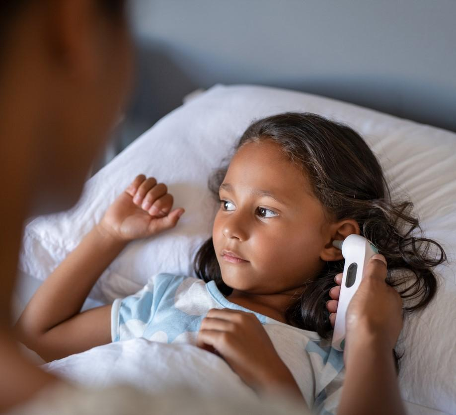 taking child's temperature