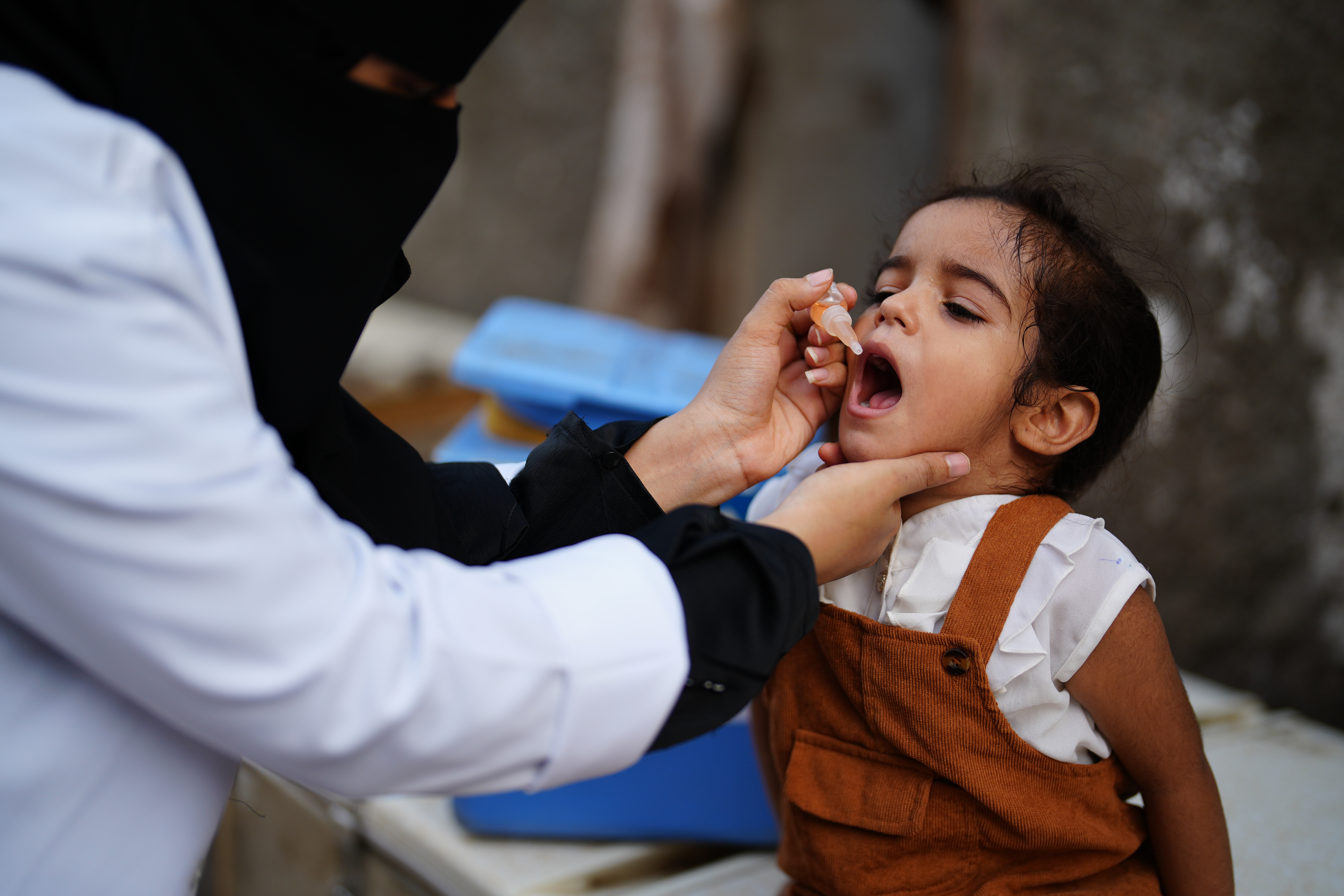 Girl being vaccinated