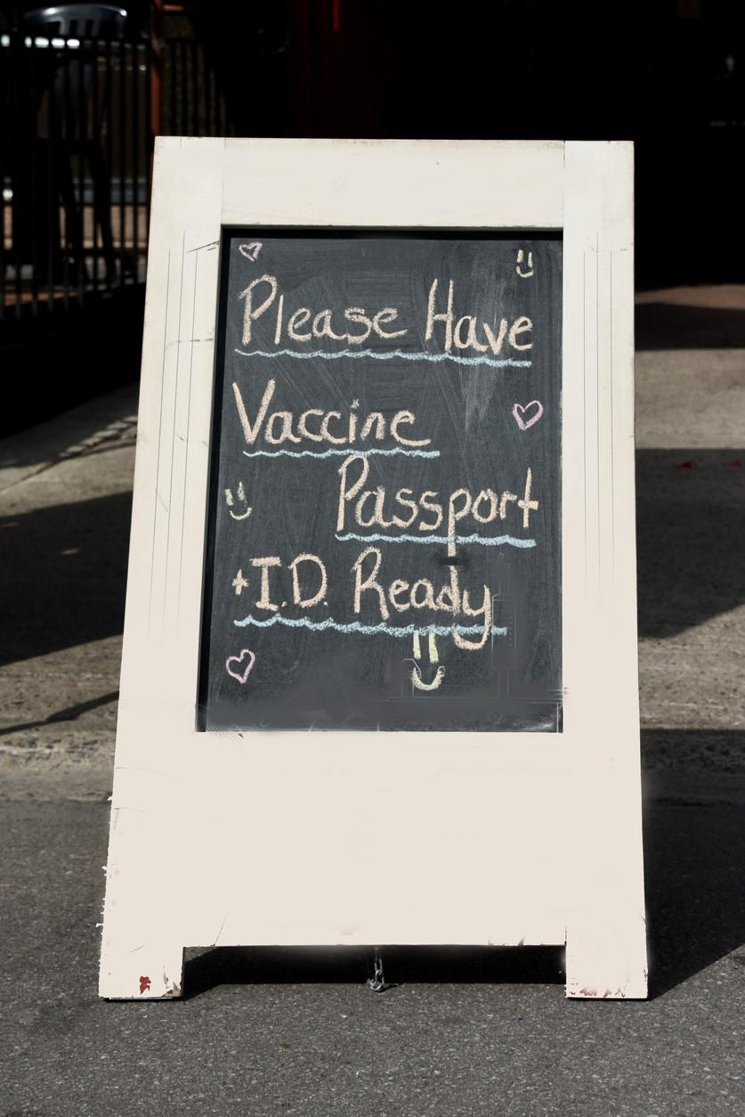 Vaccine mandate sandwich board