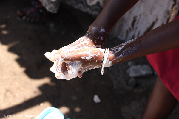 Woman washing hands