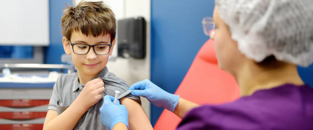 Young boy getting vaccinated