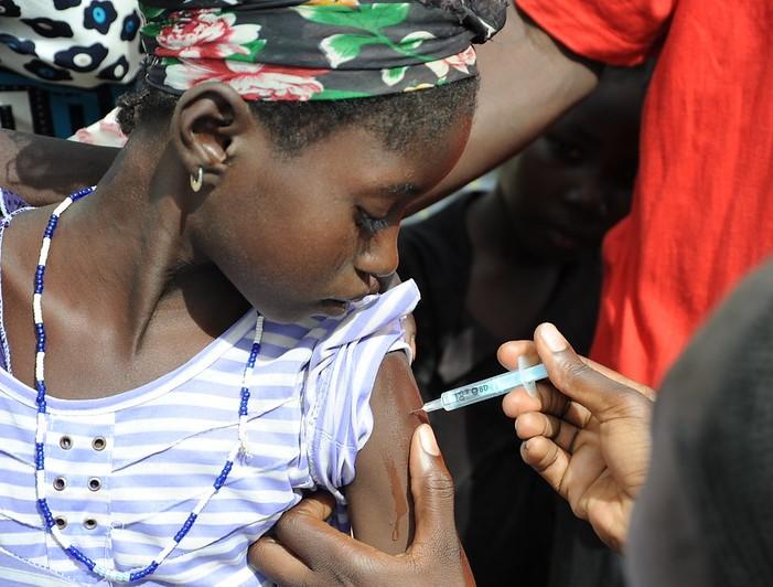 Young girl receives meningitis vaccine