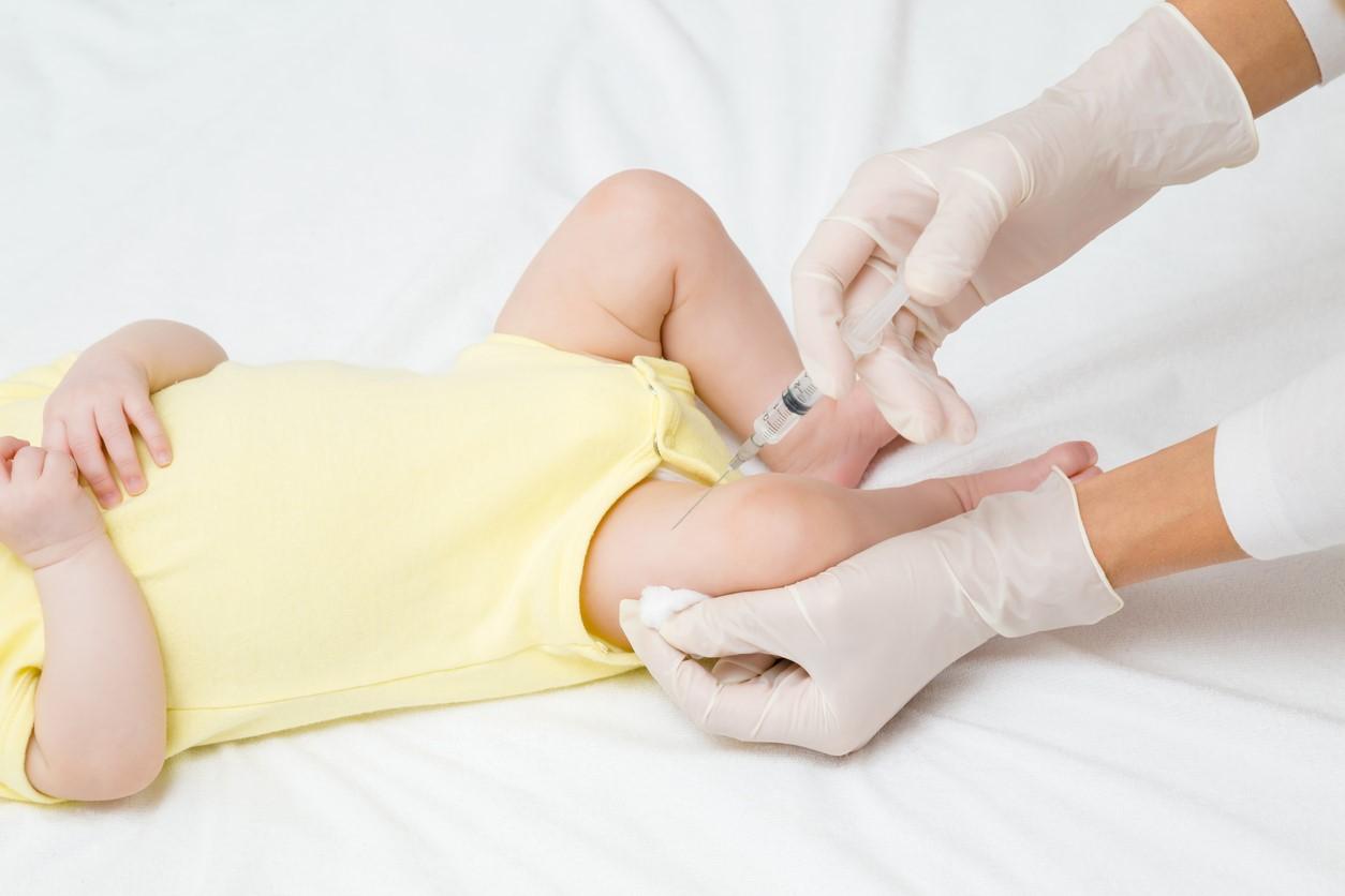 baby prepped for vaccine