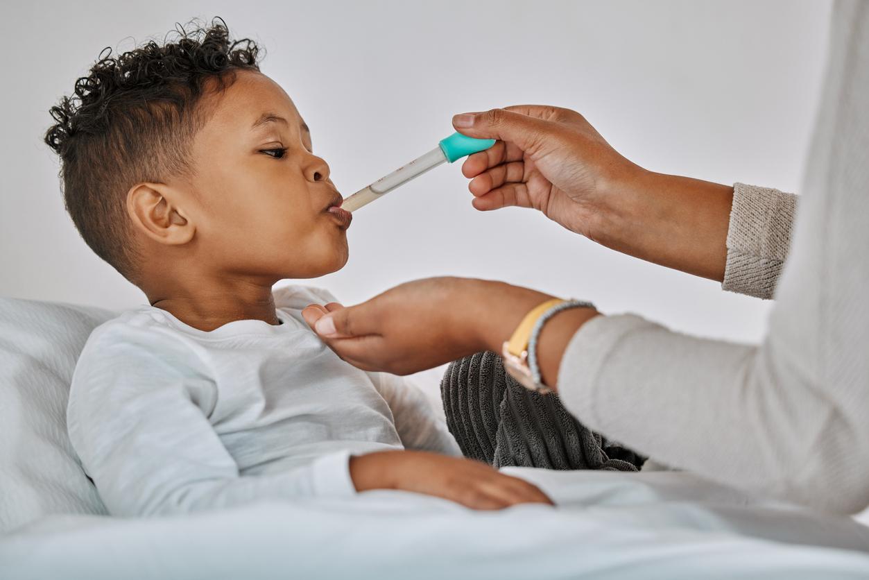 Child receiving medicine