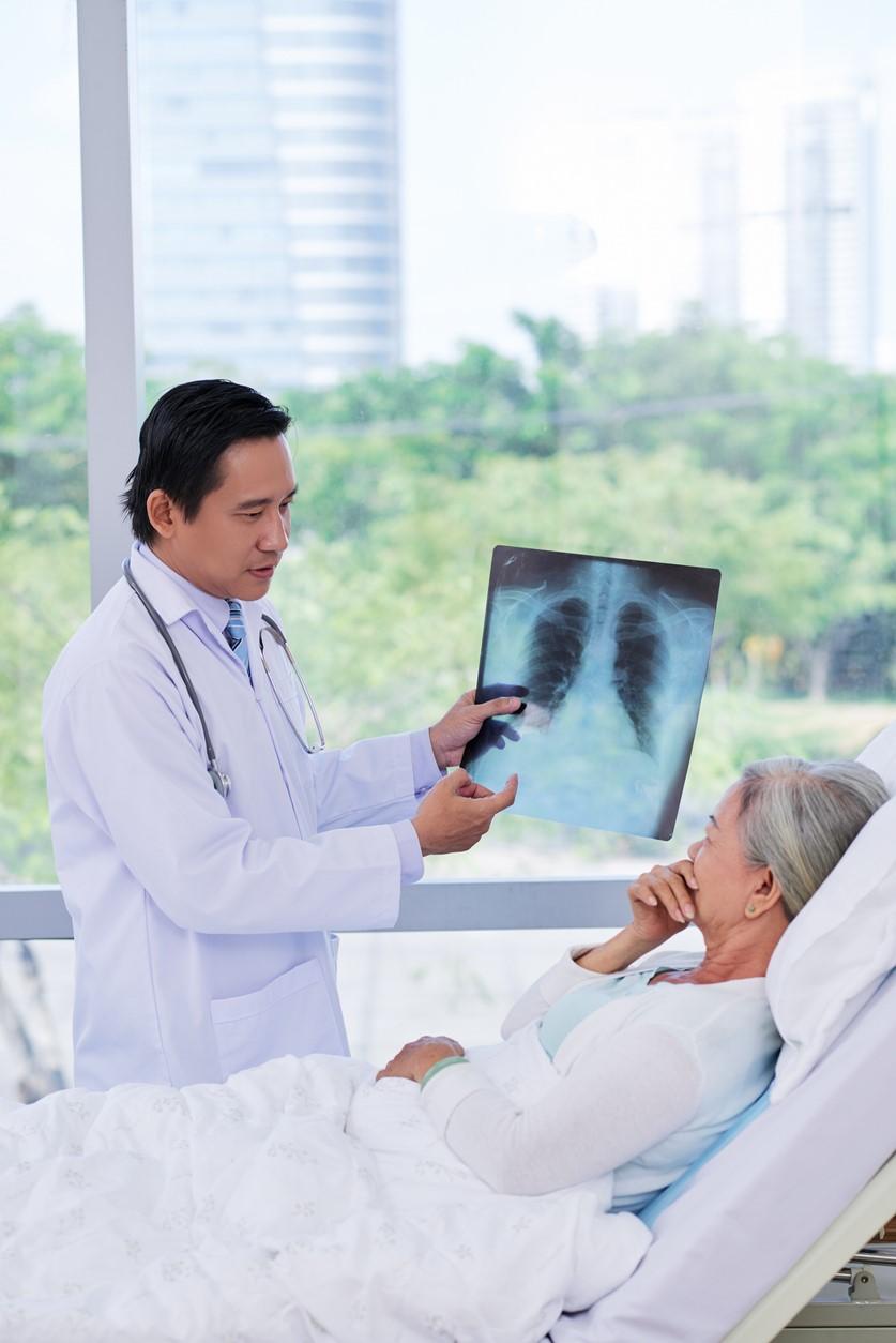 Doctor and patient with chest x-ray