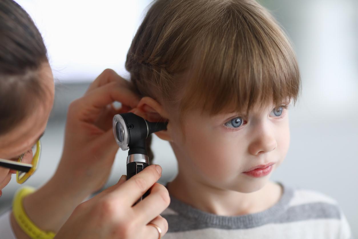 Child having ear examined