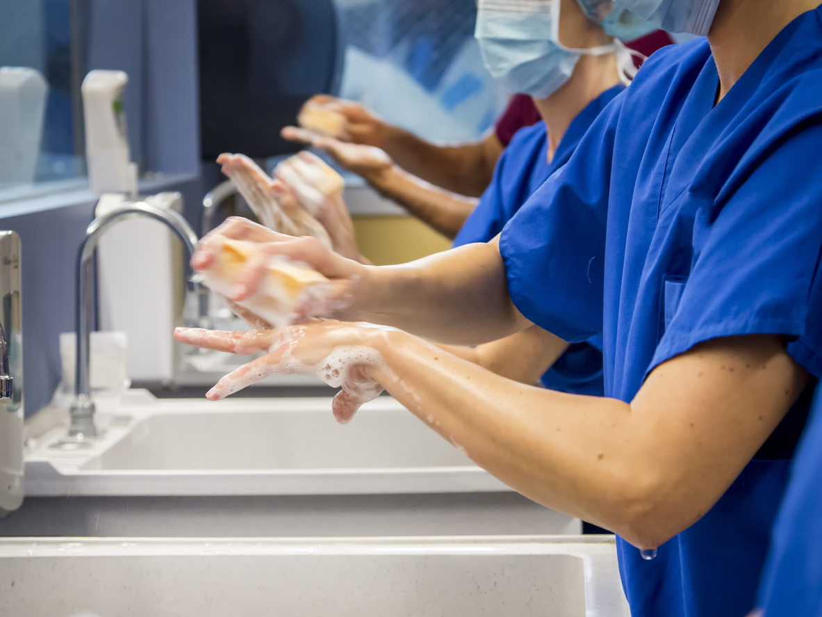 Surgeons washing hands