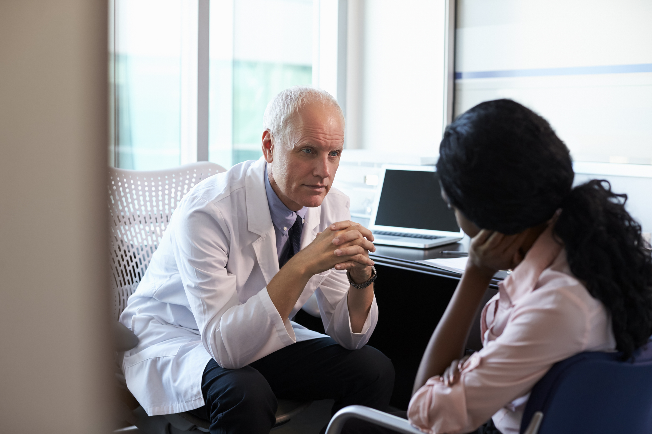 Doctor talking to patient