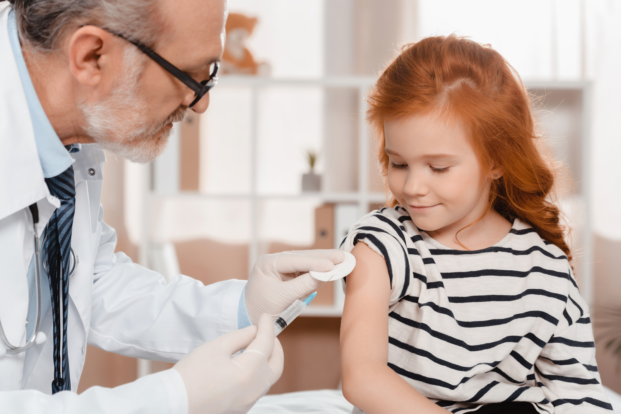 Doctor gives shot