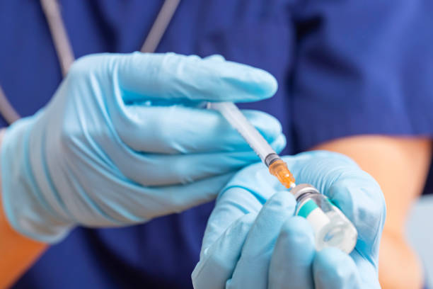 Healthcare provider readying vaccine