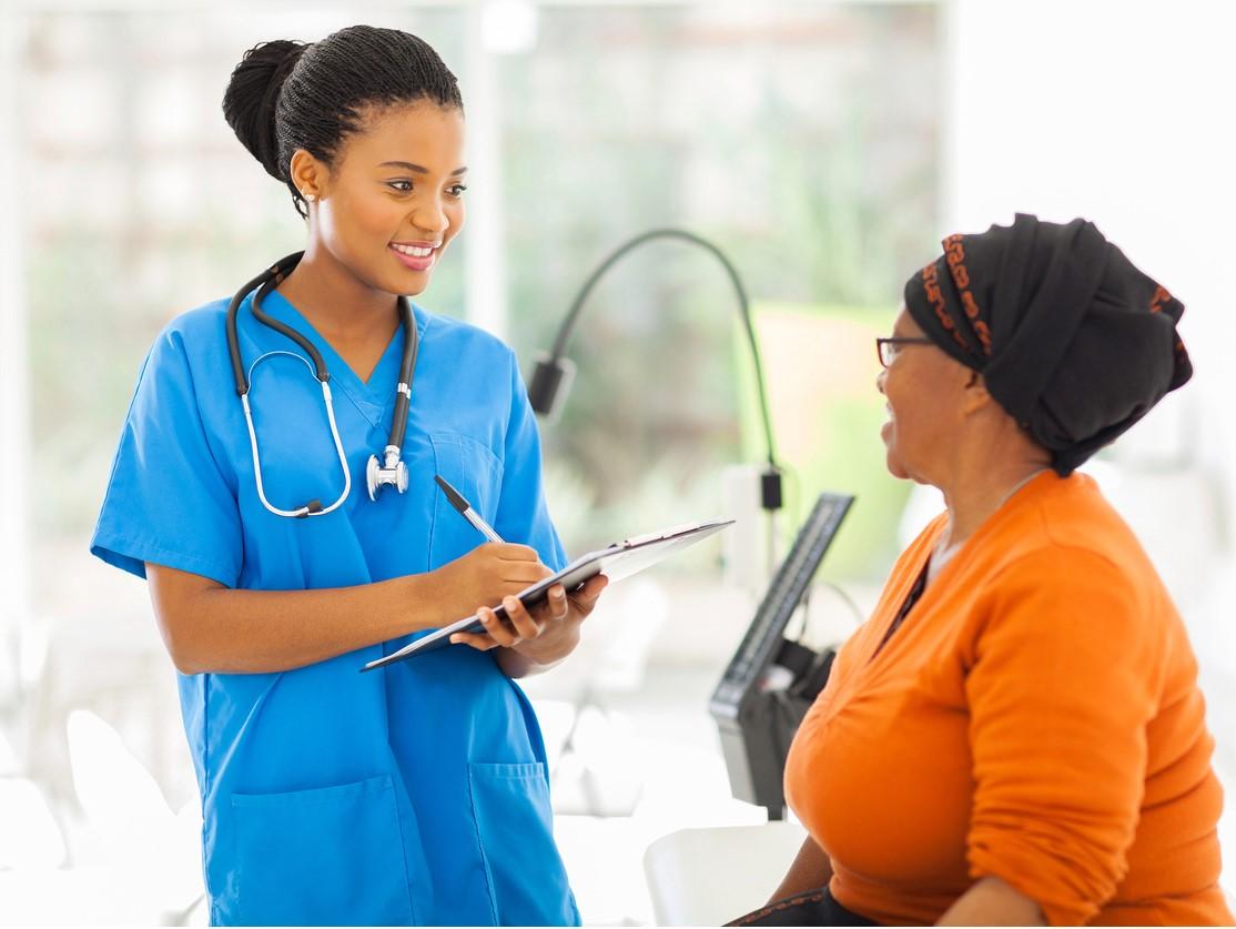 Nurse speaking with patient