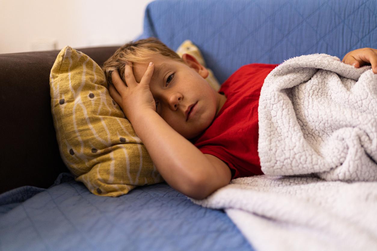 Sick boy on couch