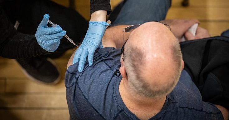 Man getting COVID vaccine