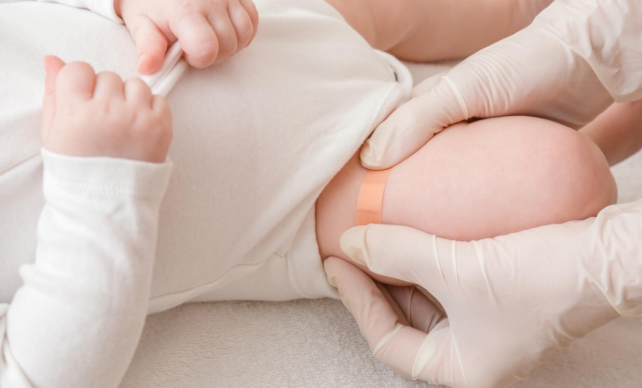 Band aid after baby vaccination