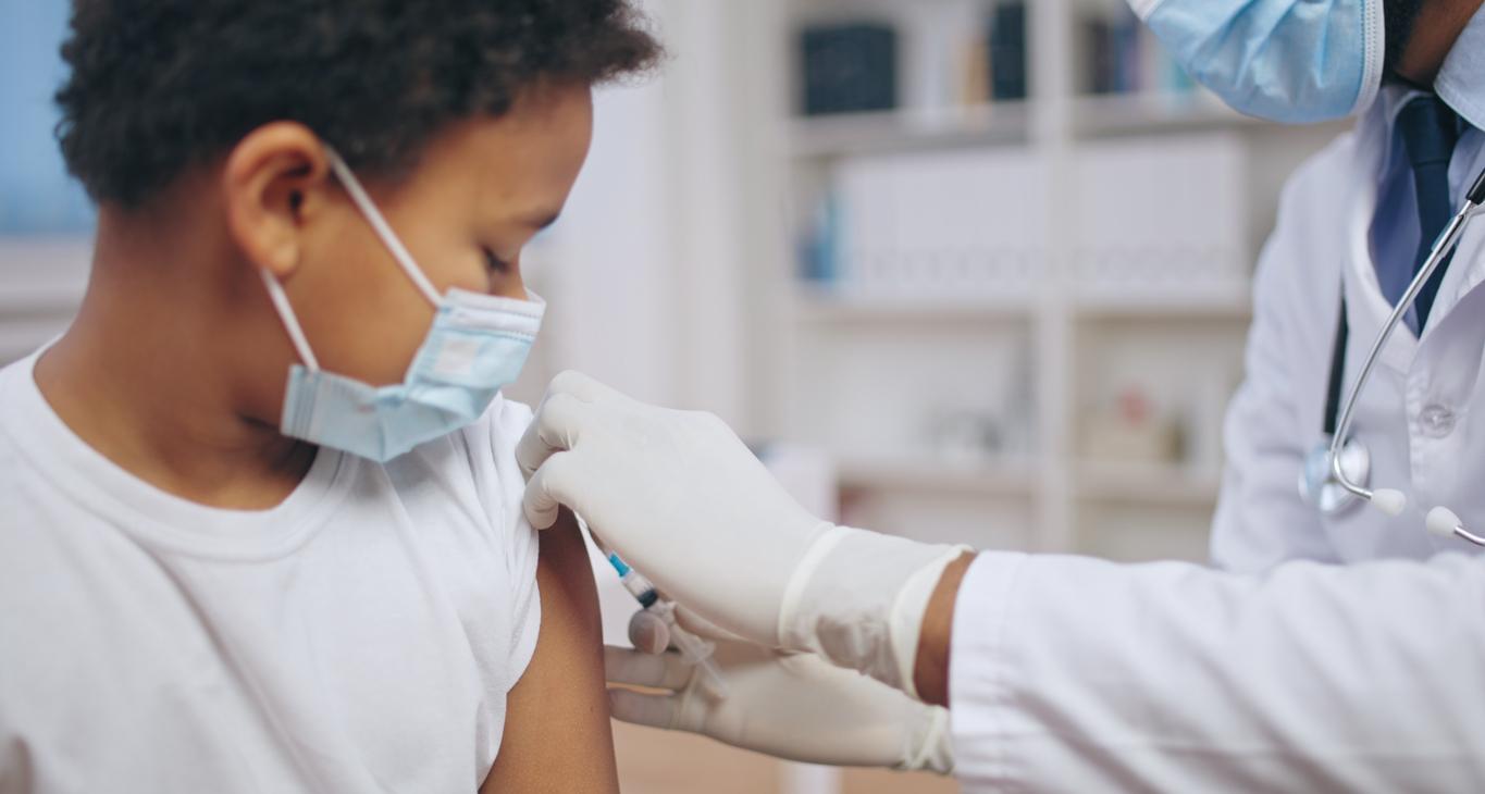 Boy getting vaccinated