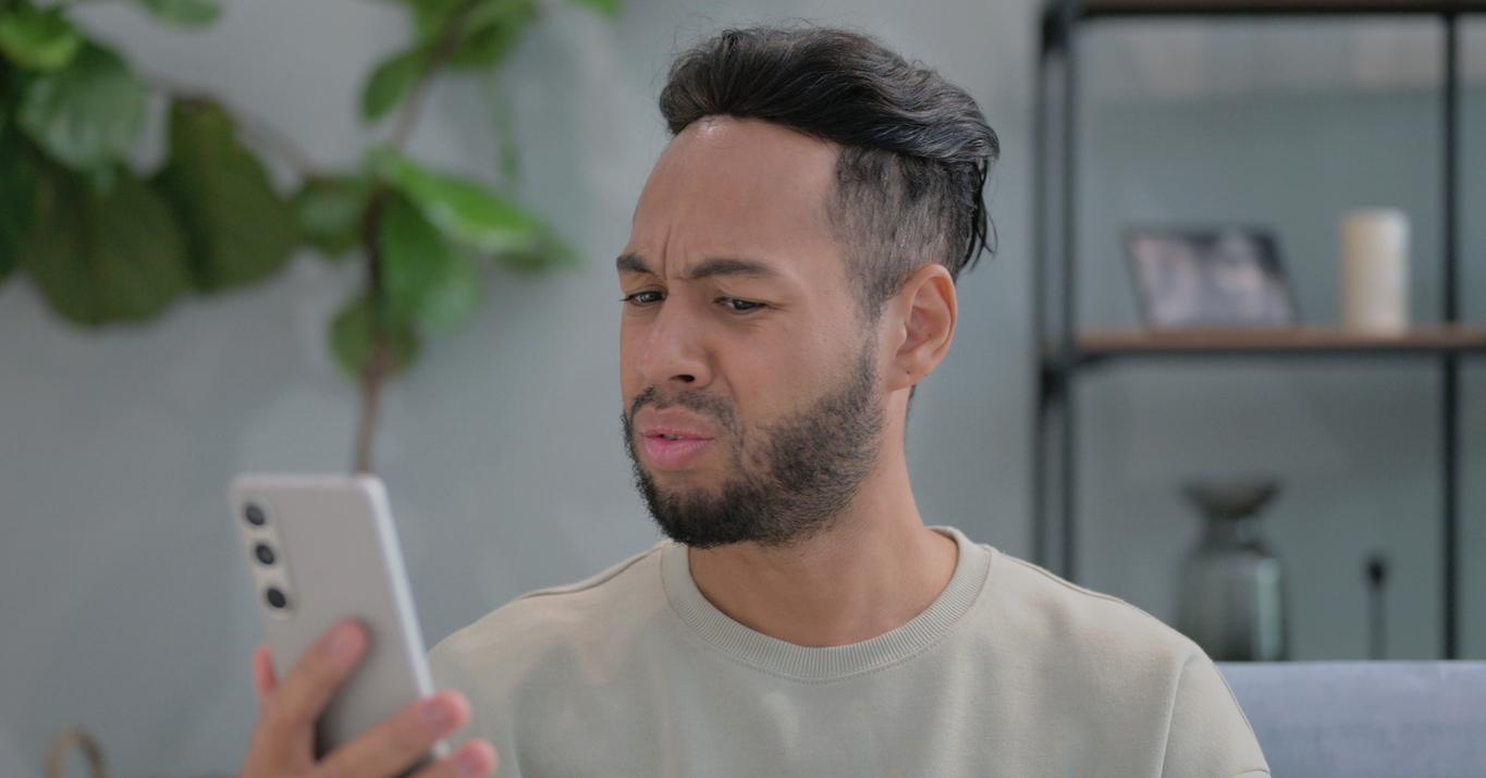 Man on phone not trusting