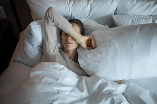 Woman lying in bed