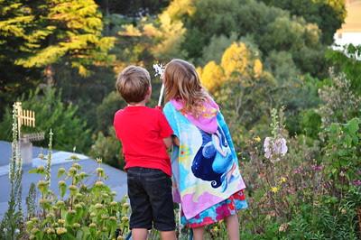 Kids drinking from hose