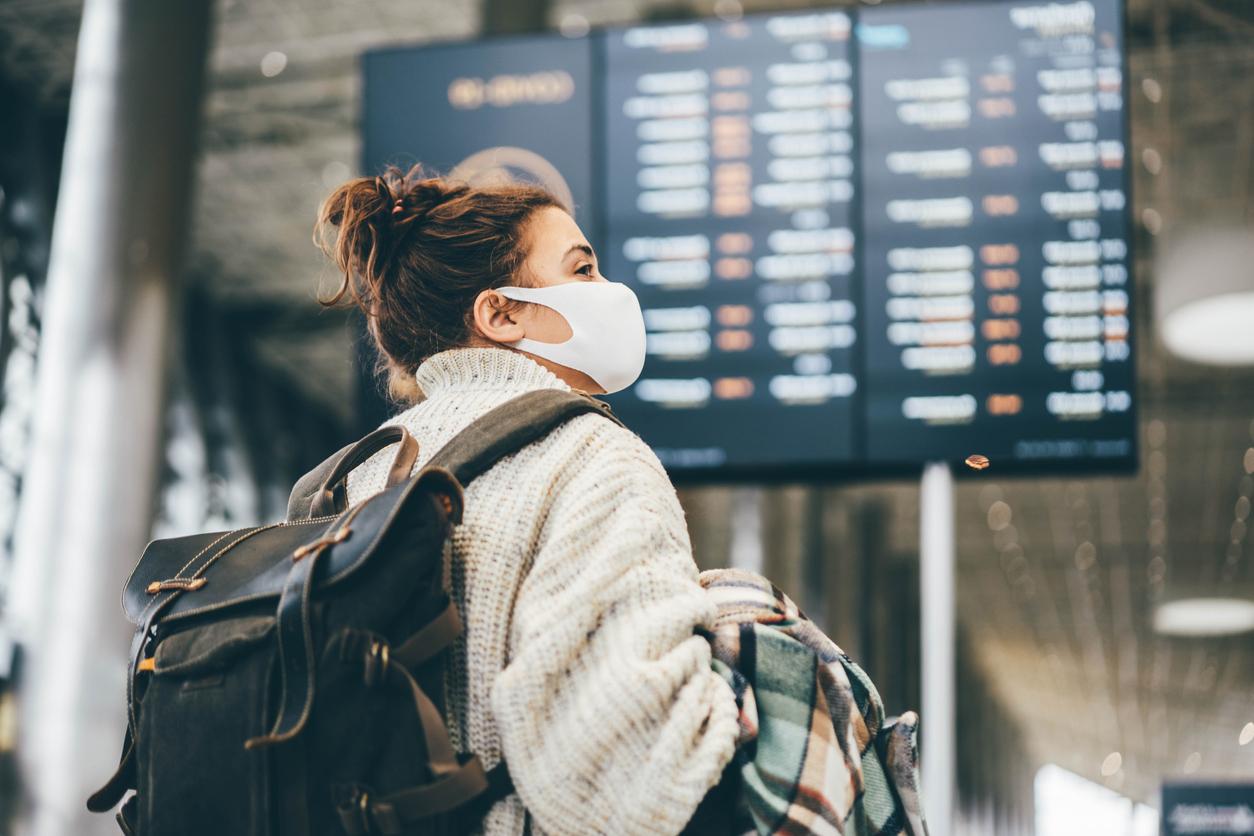 Masked air traveler