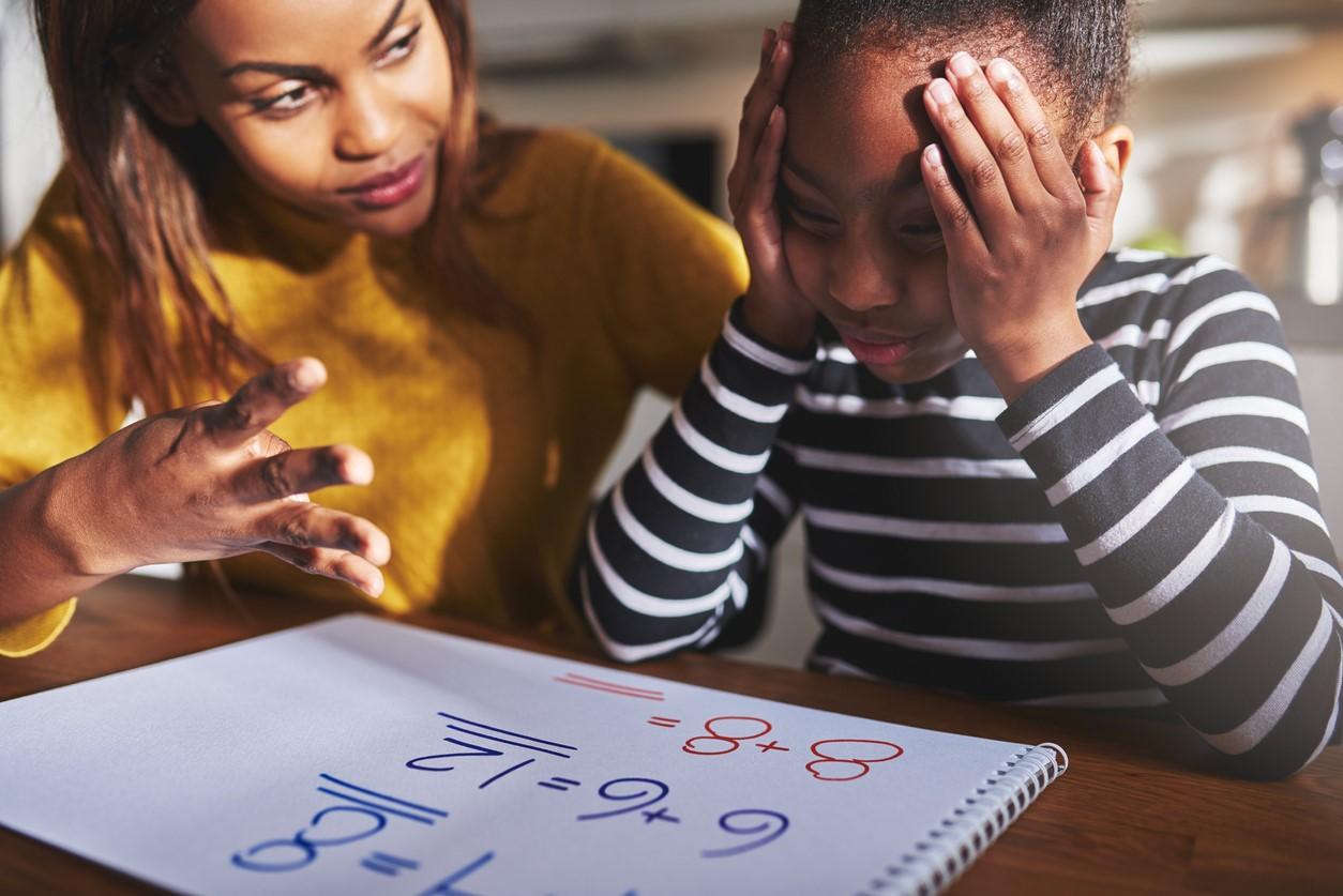 Mom working on math with son