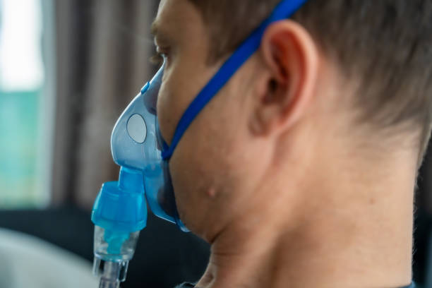 Man with nebulizer