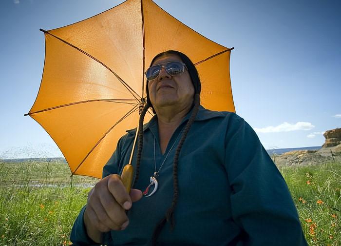 New Mexico native man with umbrella