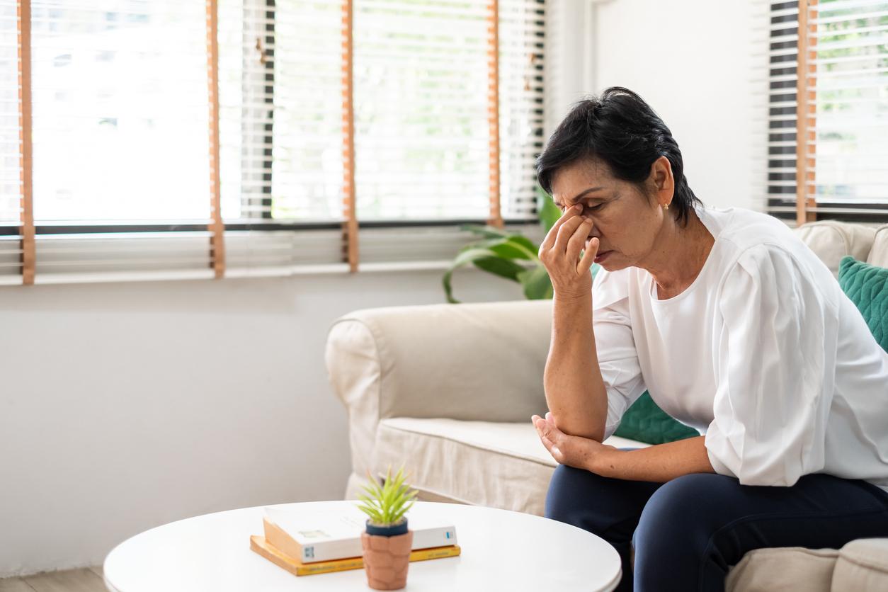 Exhausted middle-aged woman
