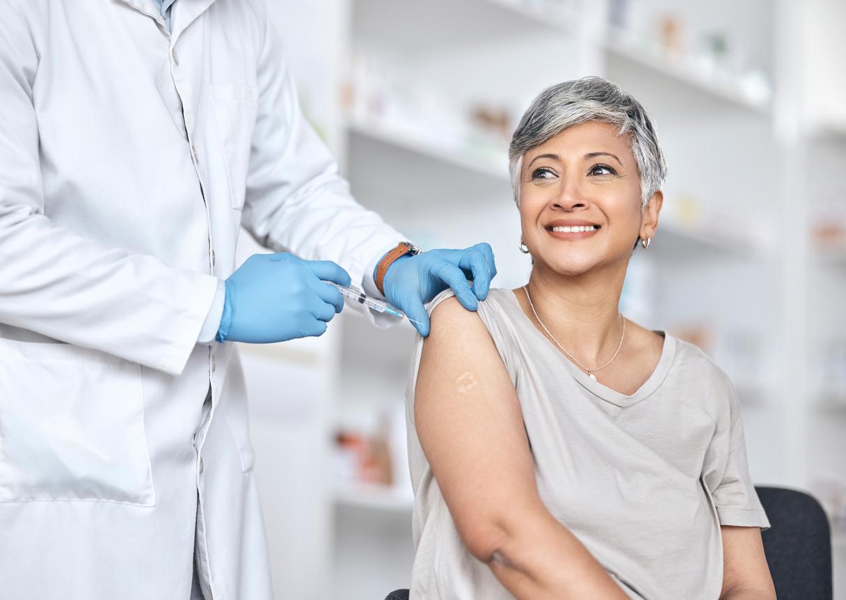 Older woman getting vaccinated