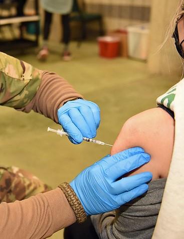 Older woman getting vaccinated